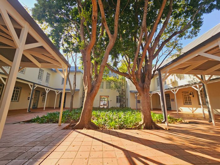 Rivonia Office To Rent: Ground floor, boardroom, kitchen, patio, and fibre access.