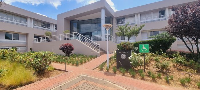 Prime Woodmead office to rent with fit-out, security, parking, and amenities.