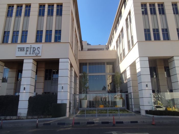 Rosebank Office To Rent: Upgraded building with secure parking, rooftop solar, and concierge.