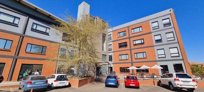 Sunninghill Office For Sale: Exposed ceilings, generator, lifts, on-site coffee shop.