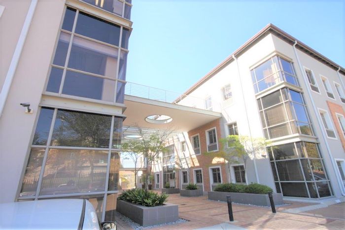 Bryanston Office To Rent: Existing fitout, boardroom, kitchen, backup power, convenient amenities.