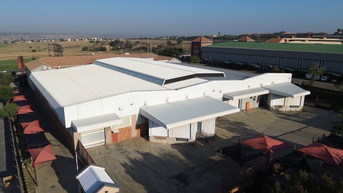 For Sale: Versatile 5,716 m² Industrial Property in Randjespark with ample parking.