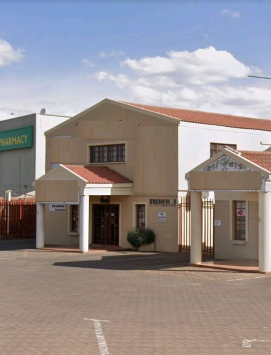 For Sale: Commercial property in Three Rivers with parking, offices, and kitchen.