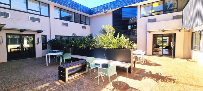 Bryanston Office To Rent: Fitout, boardroom, kitchen, security, parking, and backup systems.