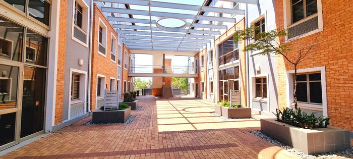 Bryanston Office To Rent: Backup systems, lifts, gardens, near amenities.