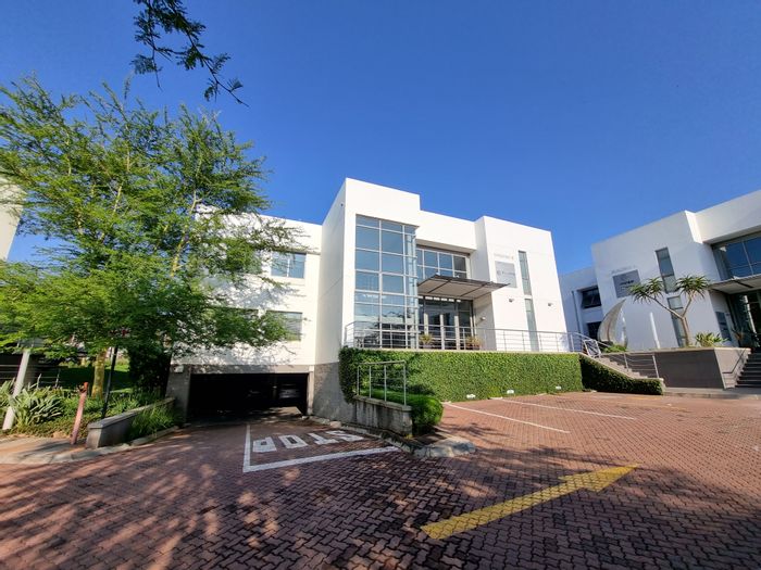 Bryanston Office For Sale: Free-standing building with boardroom, kitchen, and coffee shop.