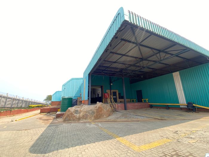 Industrial property for sale in Randjespark with four manufacturing plants and office block.