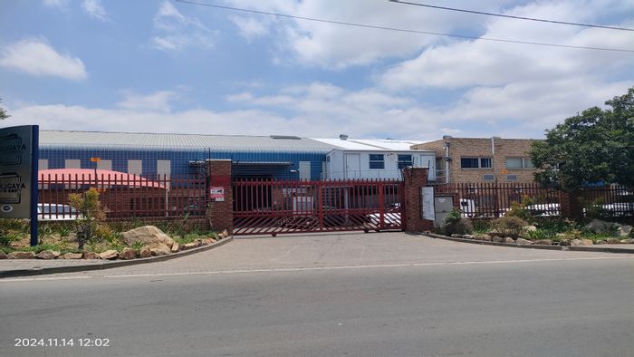 Industrial property in North Riding to rent, featuring warehouse, offices, and secure access.