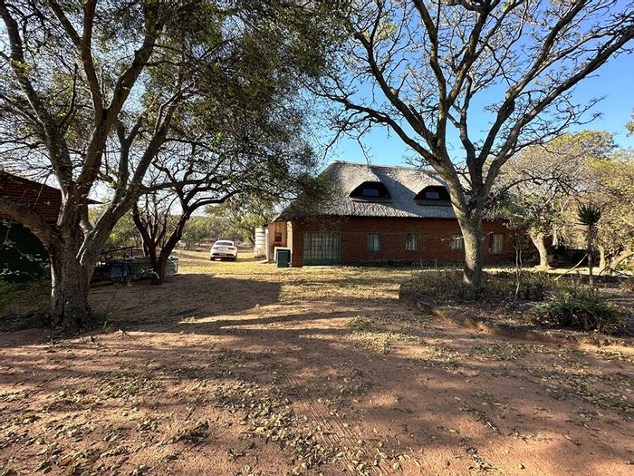 Farm for Sale in Modimolle Central: Spacious home, borehole, pool, and natural pond.
