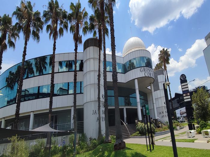 Office To Rent in Rosebank with balcony, parking, and excellent transport access.