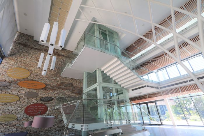 Bryanston Office To Rent: Furnished space with backup utilities and scenic patios.