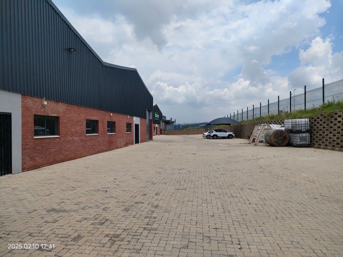 Industrial warehouse to rent in Cosmo Business Park with 24-hour security.
