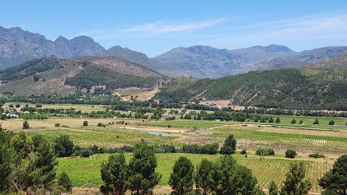 Franschhoek Rural Farm For Sale: 120ha with historic manor, irrigation, and development potential.