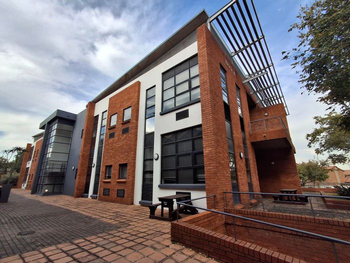 To Rent: Office in Eco Park Estate with private offices, kitchen, and patio.