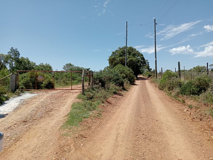 For Sale: 55.86-hectare Rocklands farm with river access, ideal for agriculture.