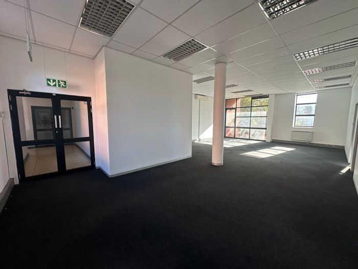 To Rent: Office in Eco Park Estate with patio, parking, and 24/7 security.