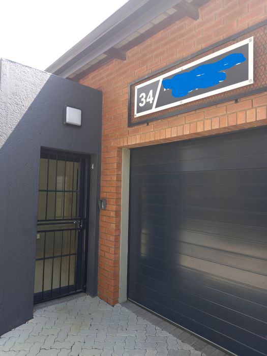 71m² Commercial Unit To Rent in Halfway Gardens with parking and secure access.