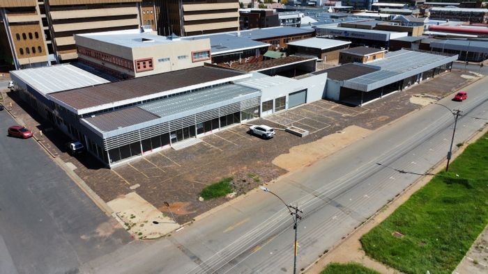 For Sale: Retail property in Klerksdorp Central with multiple showrooms and service center.
