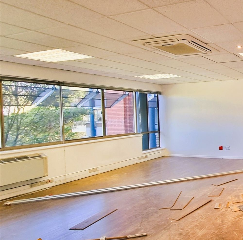 Open plan area with laminate flooring