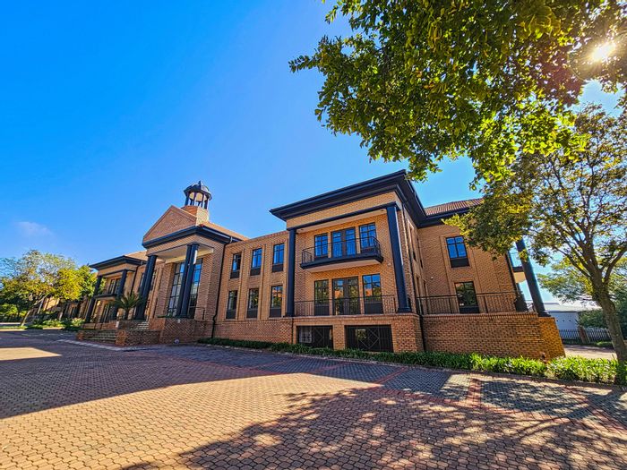 Morningside Office To Rent: Renovated, secure park with direct Virgin Active access.