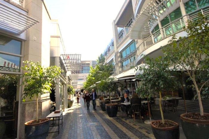 1,274m² Office To Rent in Rosebank, near Gautrain, with patios and parking.
