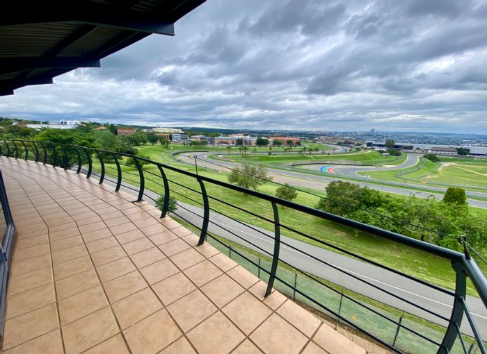 Kyalami Office To Rent: Fully fitted suite with balcony, kitchen, and secure access.
