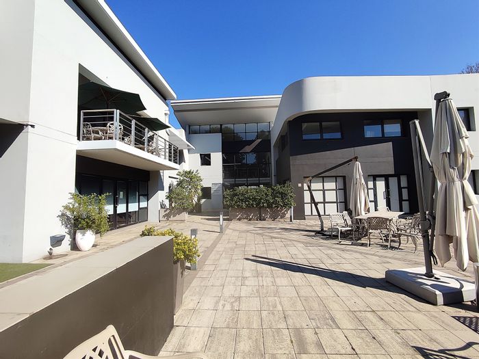 Office To Rent in Hyde Park: A-Grade space with solar power, outdoor patio, and signage.
