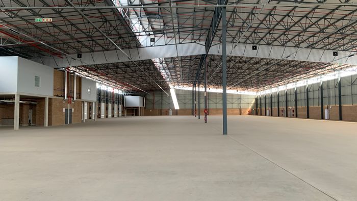 Industrial space to rent in Airport Park with docked doors and security access.