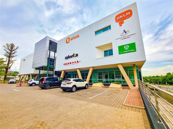 Office to Rent in Fourways: Glass offices, boardroom, kitchen, near retail amenities.