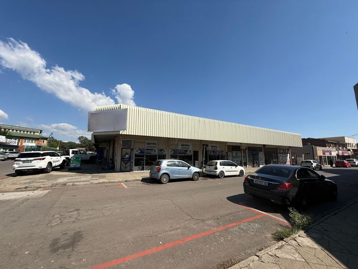 For Sale: Business in Mid Town with diverse income from retail and residential units.