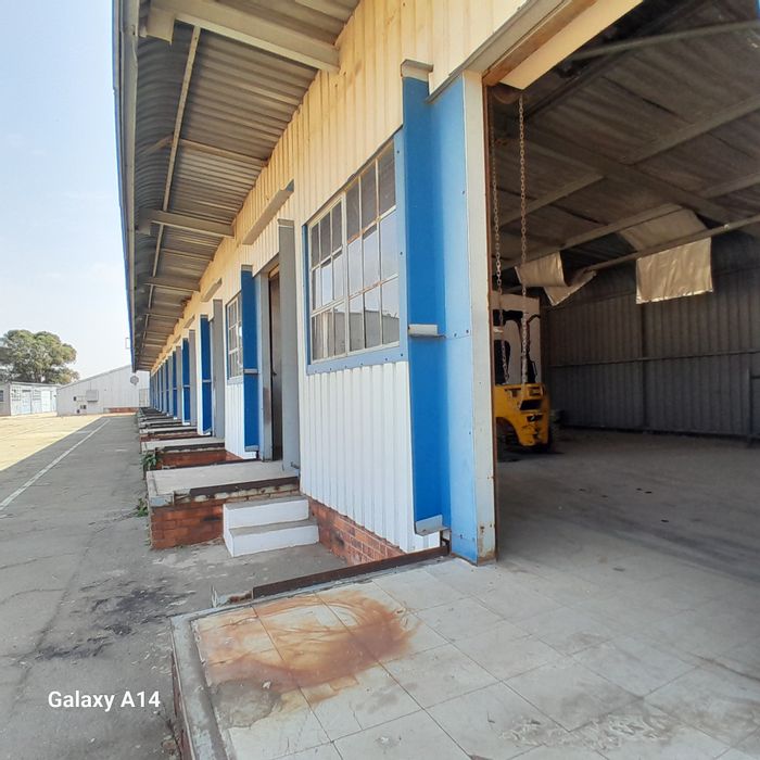 Industrial units to rent in New Era with loading ramps and roller doors.