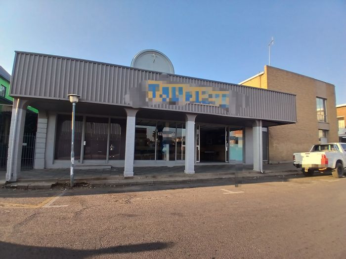 Commercial property for sale in Rustenburg Central, prime location with rental income potential.
