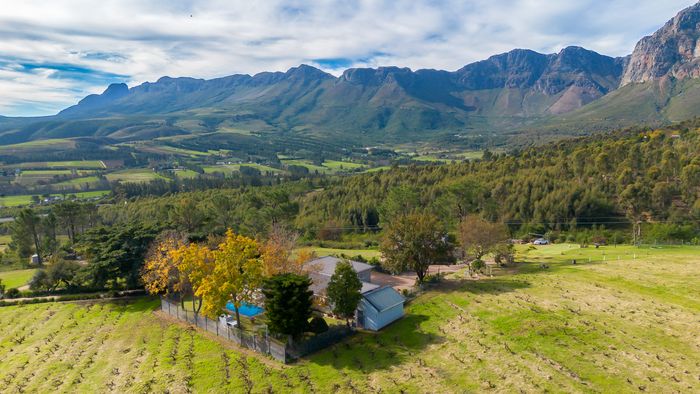 For Sale: Paarl Rural farm with income potential, multiple residences, and scenic views.