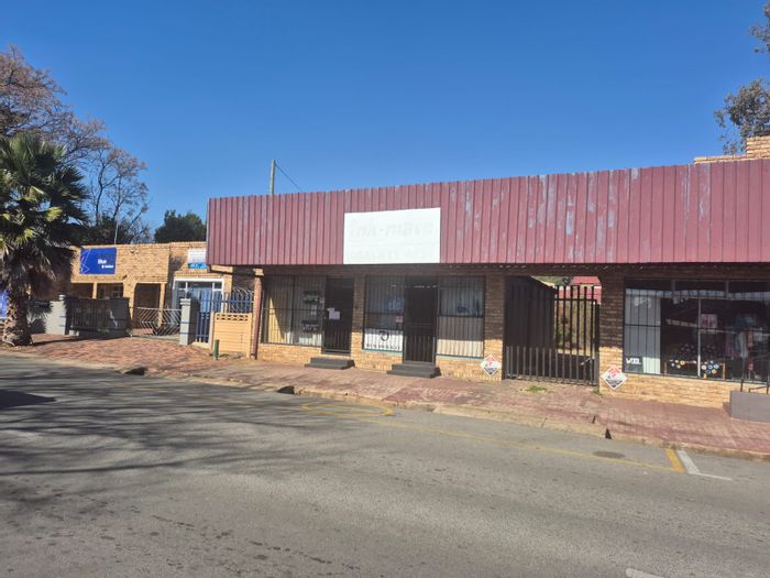 For Sale: Commercial property in Parys Central with 4 retail shops and parking.