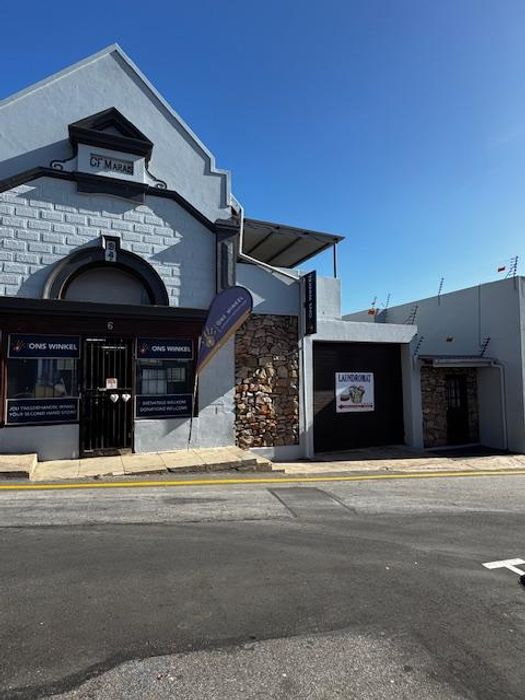 Prime commercial property in Mossel Bay Central with sea views and flexible layout.