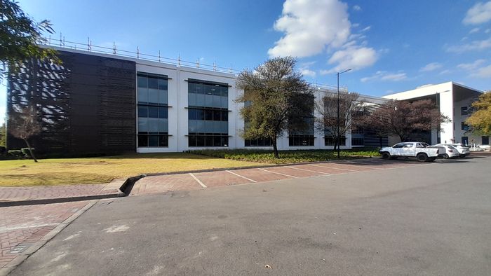 Spacious Waterfall office to rent with boardrooms, kitchen, and secure parking.