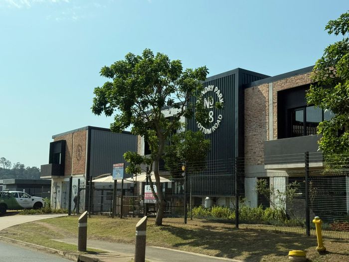 Cornubia Central Industrial Units For Sale: Security, parking, mezzanine, and easy highway access.