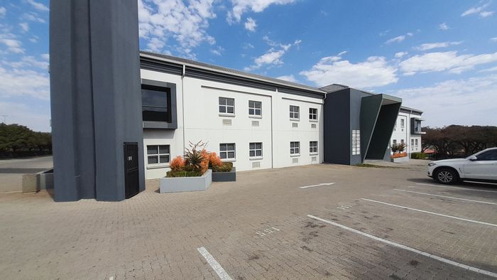 Industrial office unit to rent in Halfway Gardens with ample parking and security.