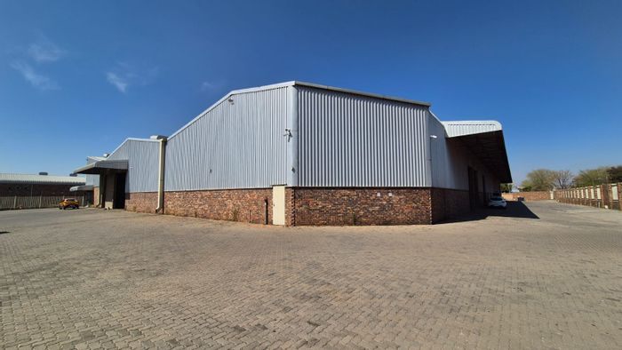 Industrial warehouse in Silverton to rent, featuring 12 roller doors and ample yard.