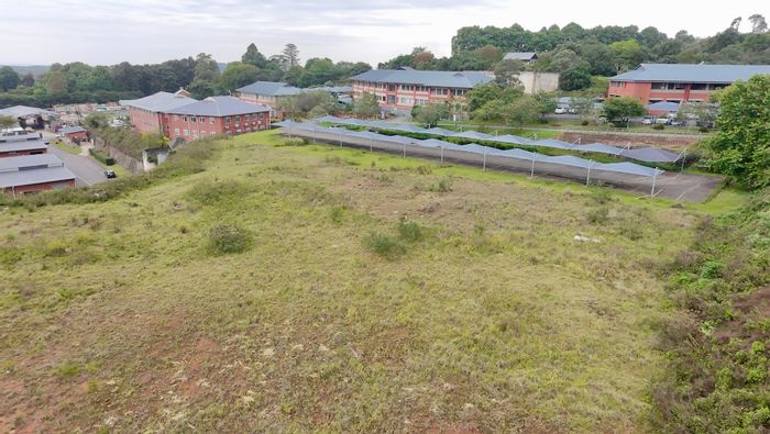 Vacant Land Commercial For Sale in Hilton Central with parking and development potential.