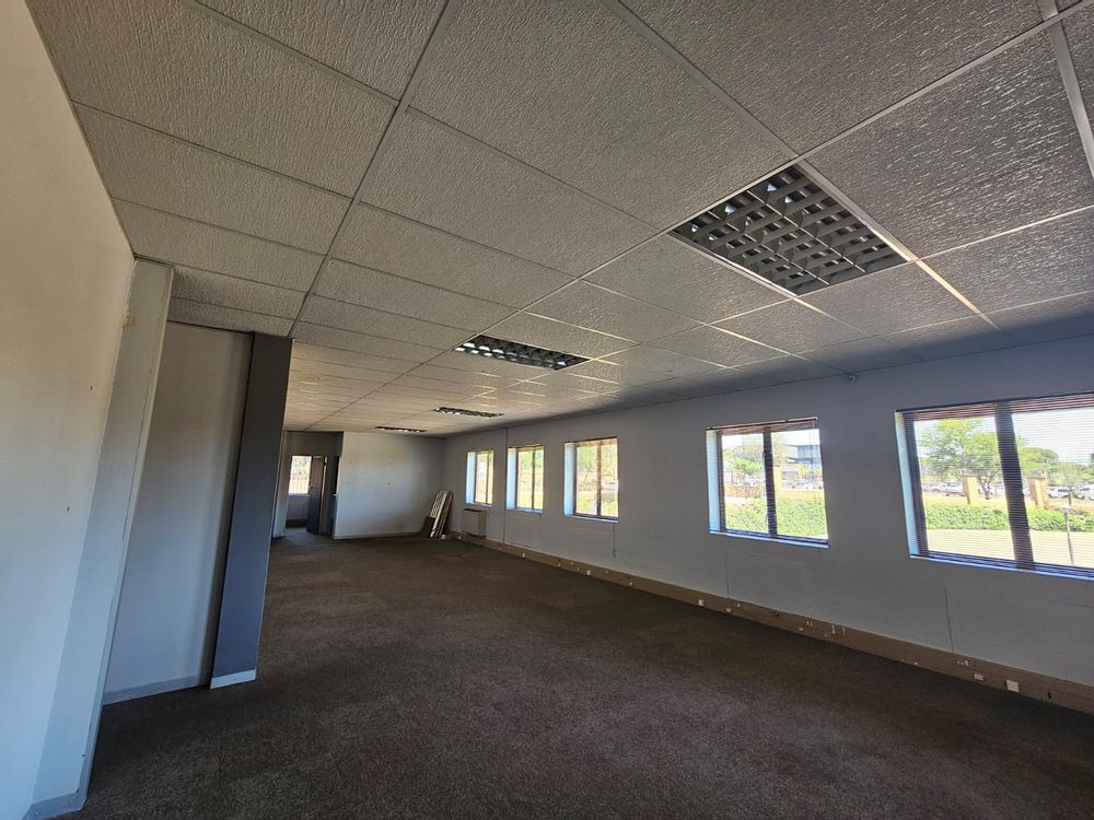 Spacious open-plan office area with flexible layout options