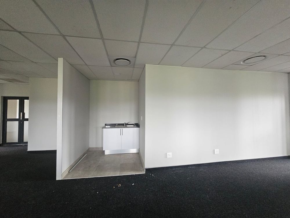 Open office with kitchen nook view