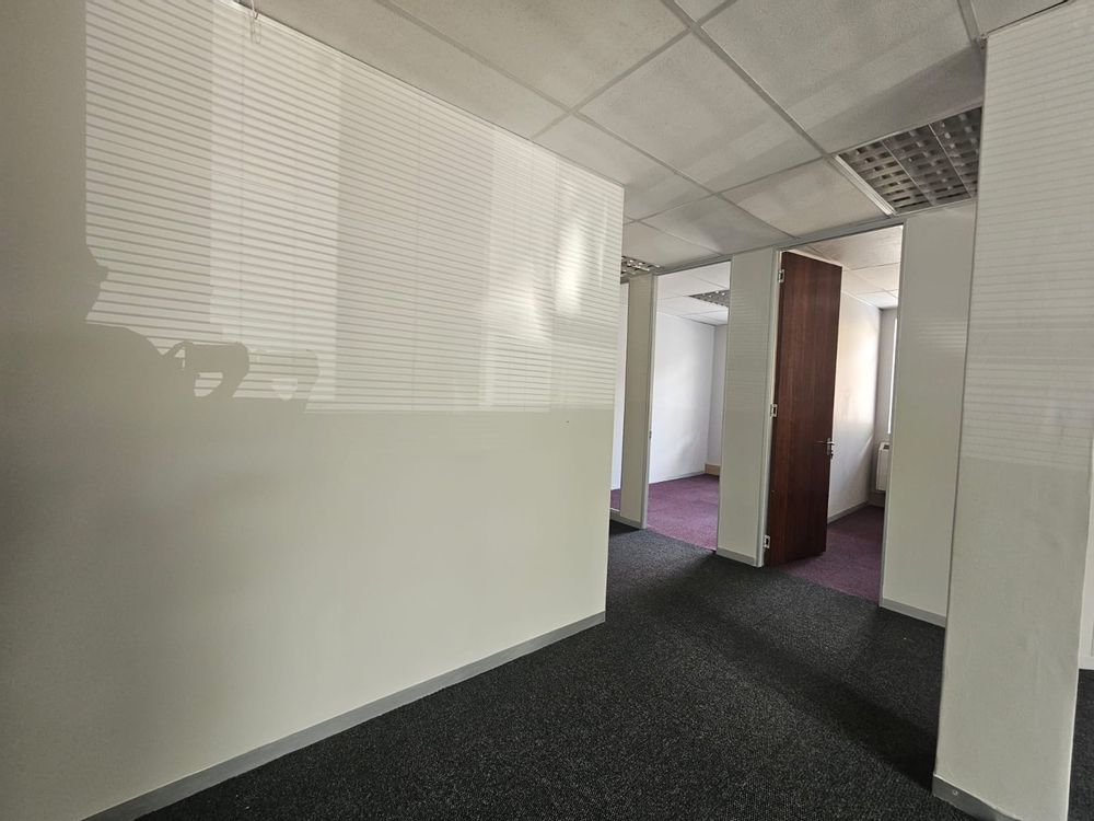 Open area leading to private offices