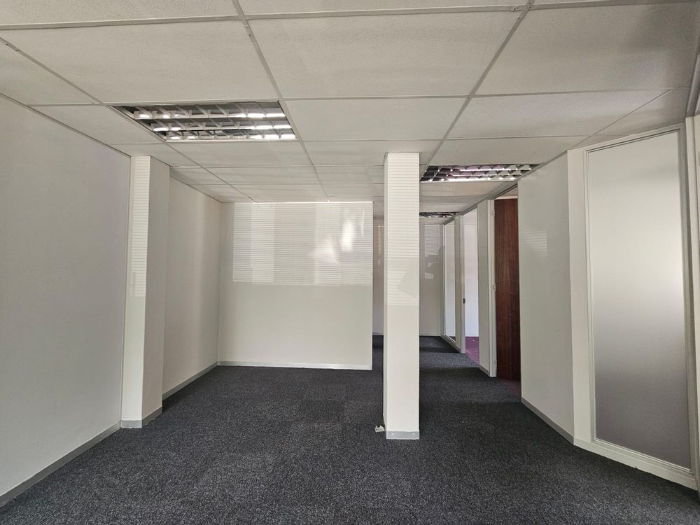 Open area leading to private offices