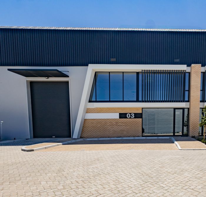 Industrial property in Stikland to rent: high roller door, offices, parking available.