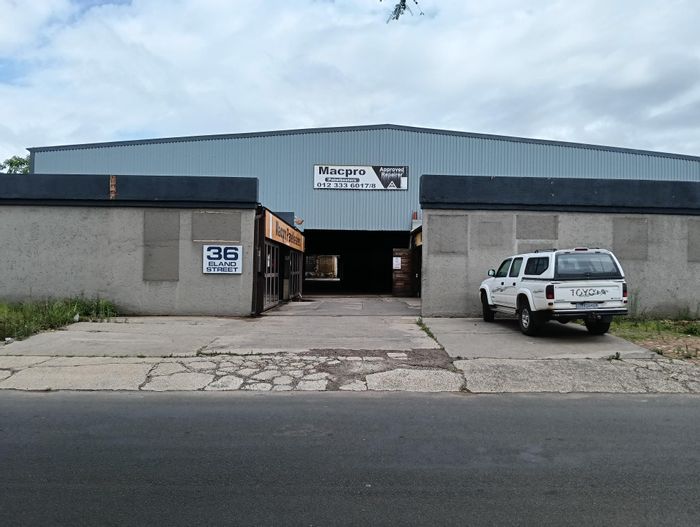 Industrial property for sale in Koedoespoort: warehouse, offices, carports, and additional stand.
