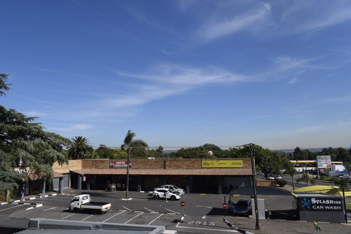 Lambton Commercial Property For Sale: Retail shops, car wash, high-traffic location.