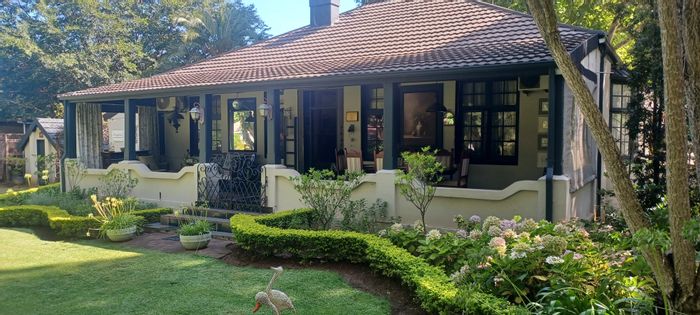 For Sale: Hilldrop Guest House with 21 rooms, pool, and expansion potential.