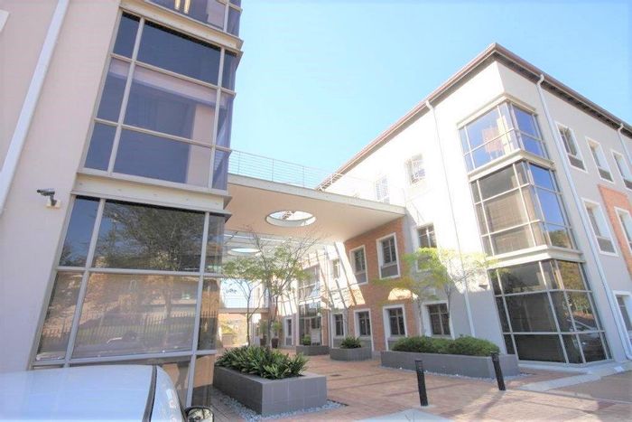 Bryanston Office To Rent: Backup power, lifts, tenant allowance, near The Campus amenities.