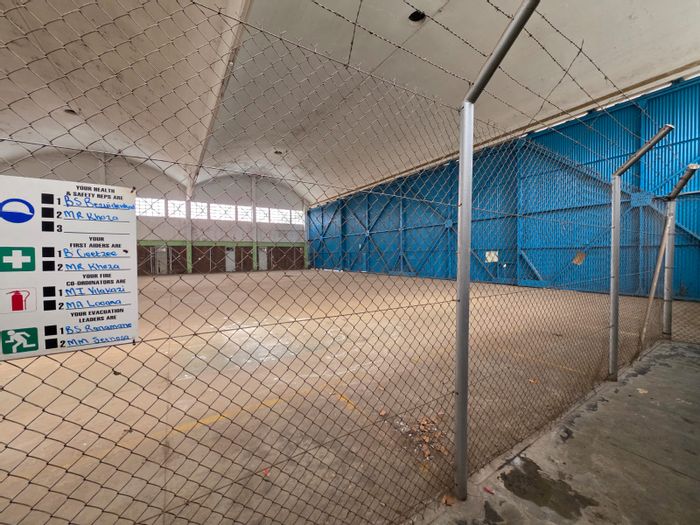 Leeuwkuil Business To Rent: Spacious warehouses, offices, and large yard for operations.